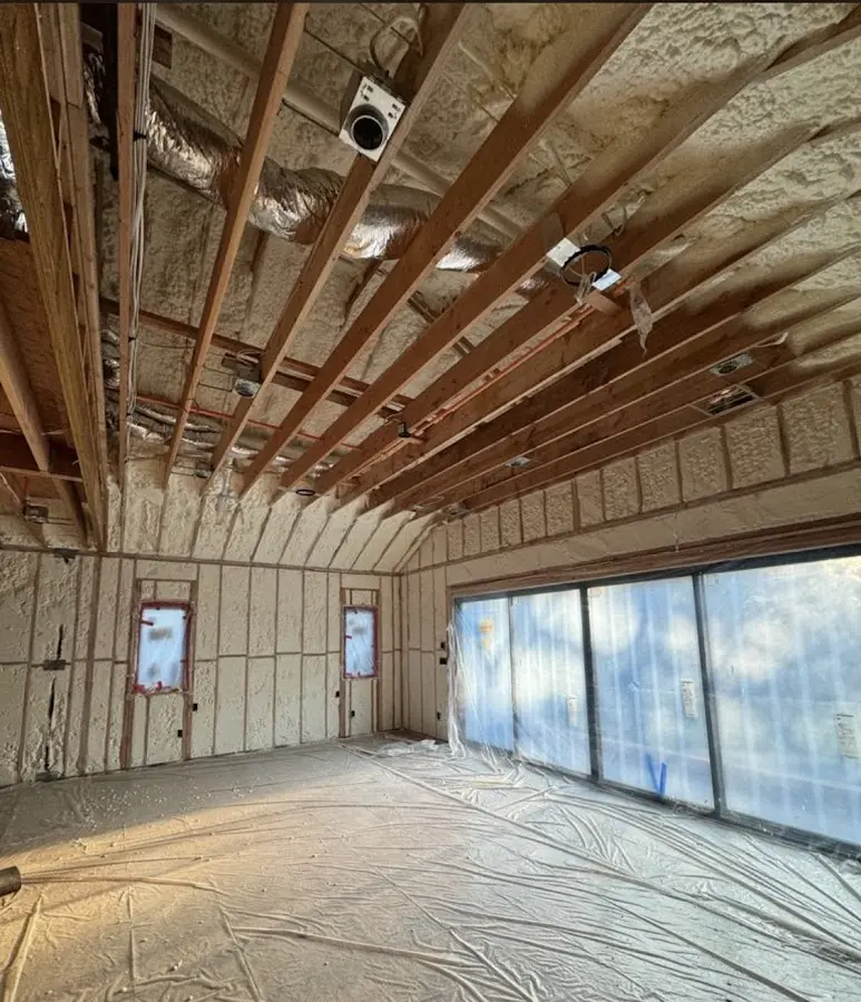 Interior walls and ceiling insulated with spray foam during new construction in Wynne